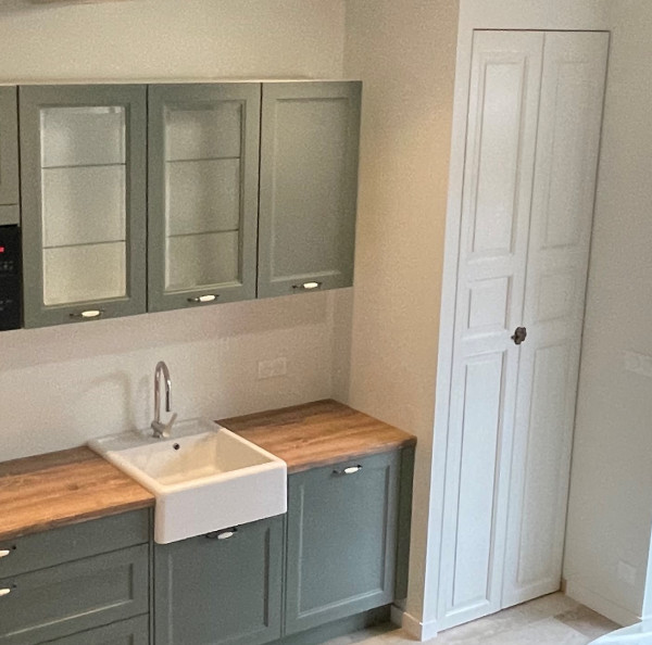 Réhabilitation d'une ancienne porte en bois à BRETEIL